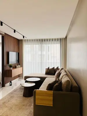 a living room with a couch and a table at Stylish Apt Casa City Center in Casablanca