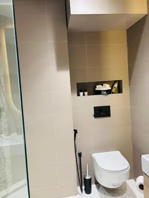 a bathroom with a toilet and a shower at Stylish Apt Casa City Center in Casablanca