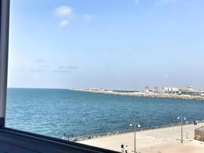 a view of the ocean from a window at 4-Marina Calma ocean-studio coconing vue mer in Casablanca