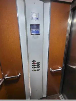 a row of elevators in a bathroom with a microwave at Cozy Room with Private Bathroom and Balcony in Casablanca