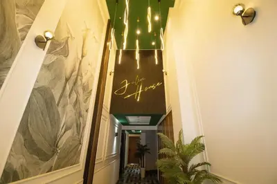 a hallway of a building with a staircase with lights at Appartement cosy et moderne au cœur de Casablanca in Casablanca