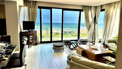 a living room with a view of the ocean at Ocean View 2 Bedroom Apartment in Casablanca
