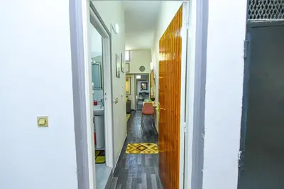 a hallway with a hallway leading to a room at Hamouda Tabina in Rabat