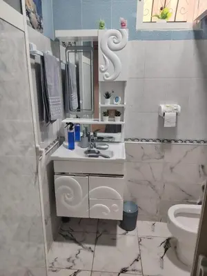 a bathroom with a sink and a toilet at Casa Hasna in Casablanca