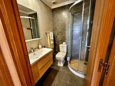 a bathroom with a toilet and a sink and a shower at Ocean side - Prestige & Douceur familliale in Casablanca