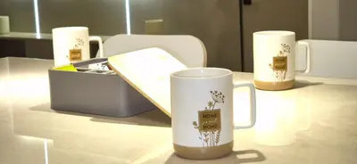 a table with three coffee mugs on top of it at Rabat Residence - OCEAN STAY 2 in Rabat