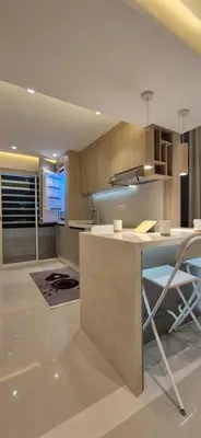 a kitchen with a island with a table in it at Rabat Residence - OCEAN STAY 2 in Rabat