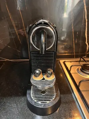 a toaster oven sitting on top of a stove at Luxury apartment in Mansouria in Mansouria