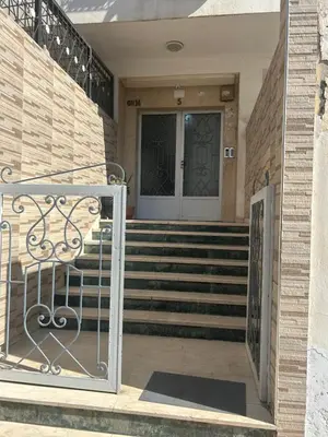 a front door of a house with a gate at Spacious Apartment Casablanca in Casablanca