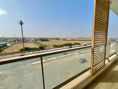 a view of a swimming pool from a window at La perla del Atlántico in Casablanca
