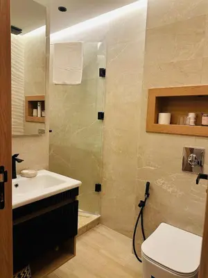 a bathroom with a sink and a shower and a toilet at Hidden Central Cozy Gem Ghandi Calm Fast WiFi Parking in Casablanca