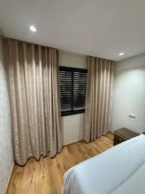 a bedroom with a bed and a window at Superbe Modern Studio Casa City Center in Casablanca
