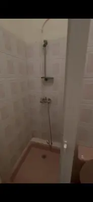 a bathroom with a shower and a toilet at Petit Nid Casablanca in Casablanca
