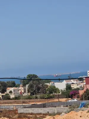 a view of a city and a body of water at Sable d'or in O Ben Slimane