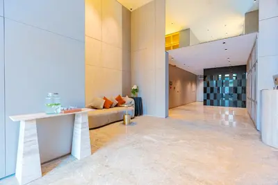 a living room with a couch and a table at Casablanca City Center Maarif in Casablanca