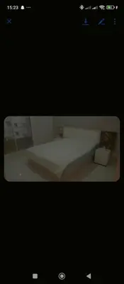 a picture of a bed in a room at Aicha Iliana in Bouznika
