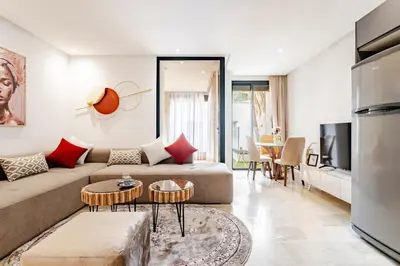 a living room with a couch and a table at 1- Bourgogne City Escape in Casablanca