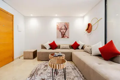 a living room with a couch and a table at 1- Bourgogne City Escape in Casablanca