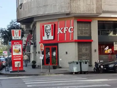 a kfc store on the corner of a street at A Cozy escape in Morocco in Casablanca