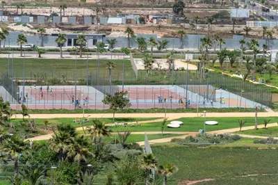 an aerial view of a park with a pool at VIVASTAY Casablanca - Ocean Park Sunset Escape beach front with swimming pool in Aïn Harrouda