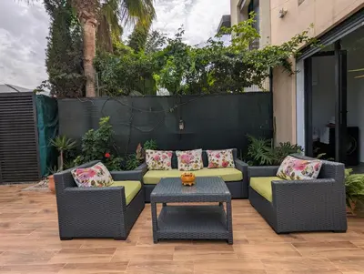 a patio with two chairs and a table at Villa 3-bedroom with Private Pool in Tamaris in Tamaris
