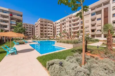 an image of an apartment complex with a swimming pool at L'Horizon - 1 BR - Pool & Terrace in Nouaseur