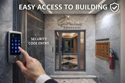 a person holding a cell phone in front of a building at Cozy Apartment Near Airport in Nouaceur