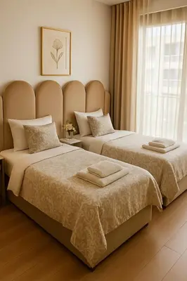 two beds sitting next to each other in a bedroom at Margueri House in Mohammedia
