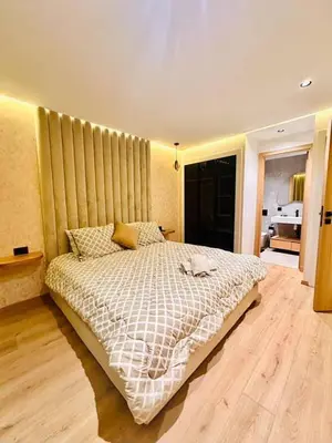 a bedroom with a large bed in a room at Modern studio in Casablanca in Casablanca