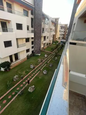 a view from the balcony of an apartment building at Luxury Beach Front Cherrat Plage Apartment in Sidi el Haj Bou Derbala