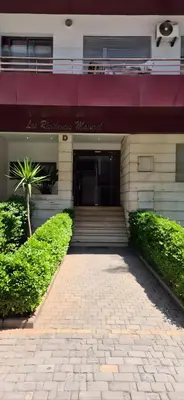 a building with a brick walkway in front of a building at VIVASTAY Casablanca - Urban Nest 3 Bedrooms High Standing Les Princesses in Casablanca