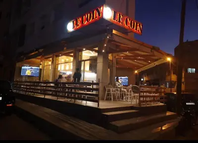 a restaurant with a sign that reads be bonneau at Bel appartement 2 chambres à Bourgogne in Casablanca