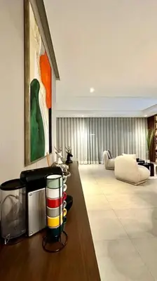 a living room with a couch and a table in a room at State of Peace in Marina - By AppartAli in Casablanca