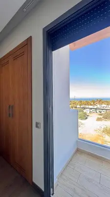 a room with a large window and a door at Family Trips or Professional Travels -By AppartAli in Casablanca
