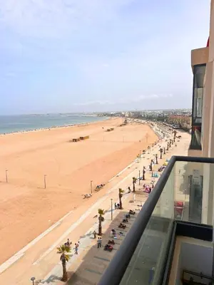 a view of the beach from the top of a building at Beautiful Apartment Residence Miramar Sea View in Mohammedia