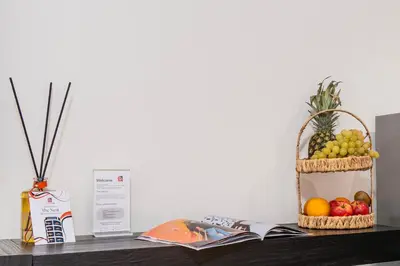 a shelf with a basket of fruit on a desk at The Nest Residence by GoodMove - Gauthier Casablanca in Casablanca