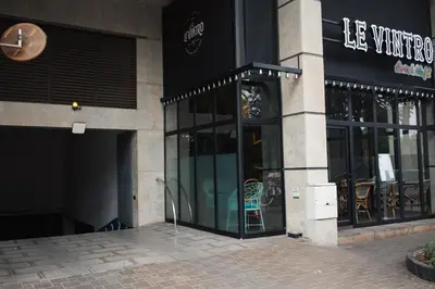 a store front of a building with a revolving door at Charming Modern Studio near Corniche Mohammedia in Mohammedia