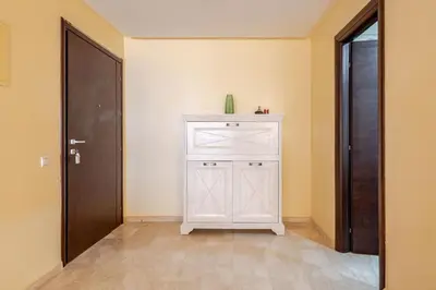 a white cabinet in a room with a door at Seaside 3 bedrooms apartment in Mansouria near Sablette Beach Mohammadia in Pont Blondin