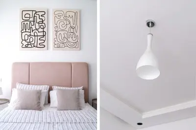 a bedroom with a bed and a light fixture at Modern and cozy studio Close to CFC & Maarif in Casablanca