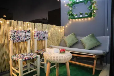 a living room with a couch and a table and chairs at R108- Gorgeous & Cosy Aprt with Wifi, Parking and Gym at the heart of Bourgogne in Casablanca-Port