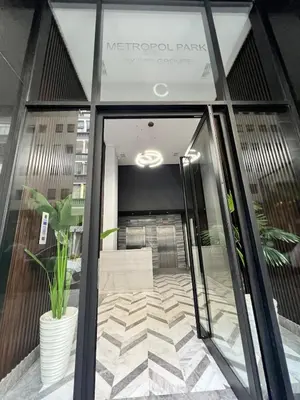 an entrance to the metropole park building at Naturalia Appart & Hotel - Casa Center in Casablanca