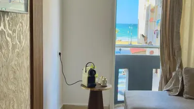 a room with a room with a view of the ocean at Super appart vue sur mer in Rabat