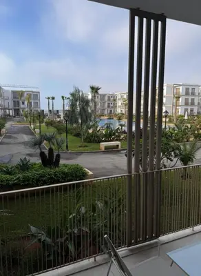 a view from the balcony of a resort at Appartement en bord de mer, Accès Plage & Parking in Mansouria
