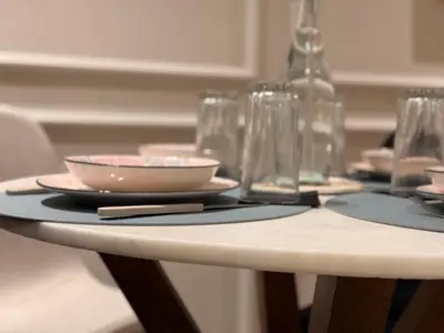 a table with plates and glasses on top of it at CityZen in Casablanca