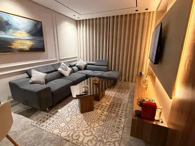 a living room with a couch and a table at CityZen in Casablanca