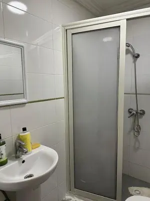 a bathroom with a shower and a sink at Studio cosy et abordable in Casablanca