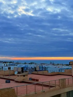 a view of a beach with houses and the ocean at Modern apartment in Rabat, Temara in Temara