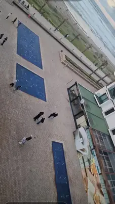 an overhead view of a building with blue tiles on the beach at Cosy home in Casablanca