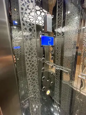 a glass door with a blue sign on it at Luxury studio Maarif à 5 min CFC in Casablanca