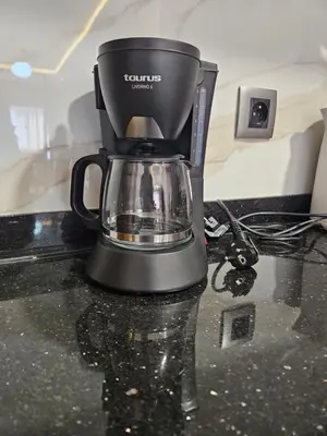 a black coffee maker sitting on a counter at Casablanca premium Suite,wifi,parking in Casablanca